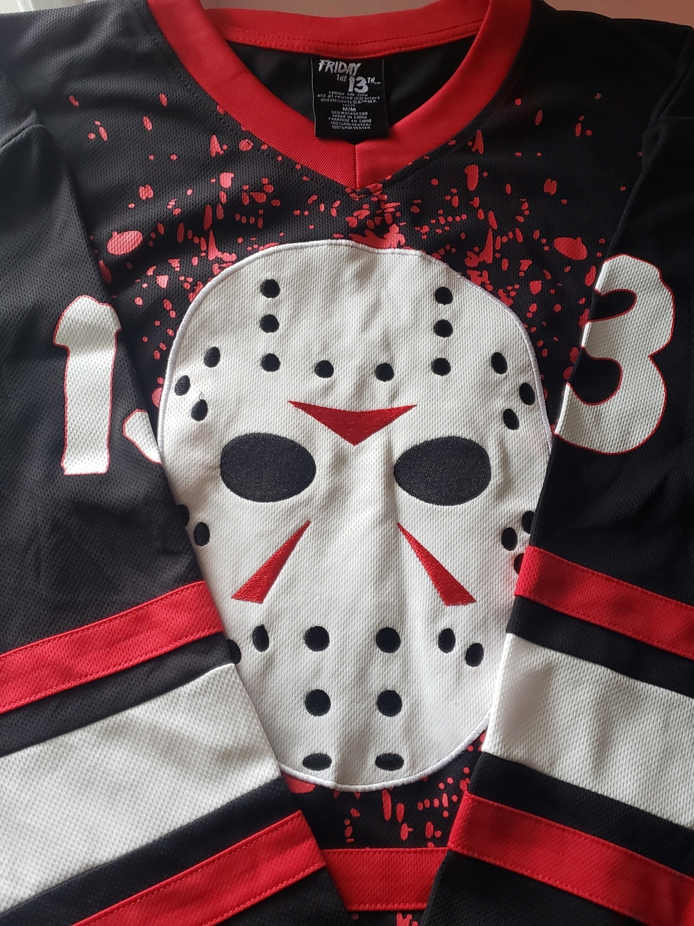 Black and Red Hockey Jersey with Mask Graphic